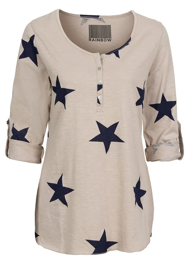 CAMISETA CON ESTAMPADO DE ESTRELLAS BEIGEAZUL