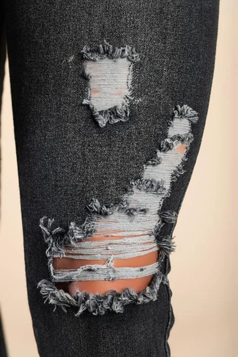 Jeans ajustados con cintura alta y aberturas Stefana, negro