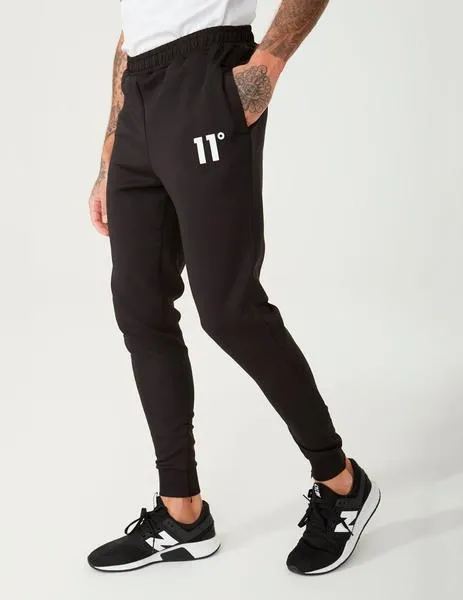 PANTALóN CORE POLY TRACK  BLACK