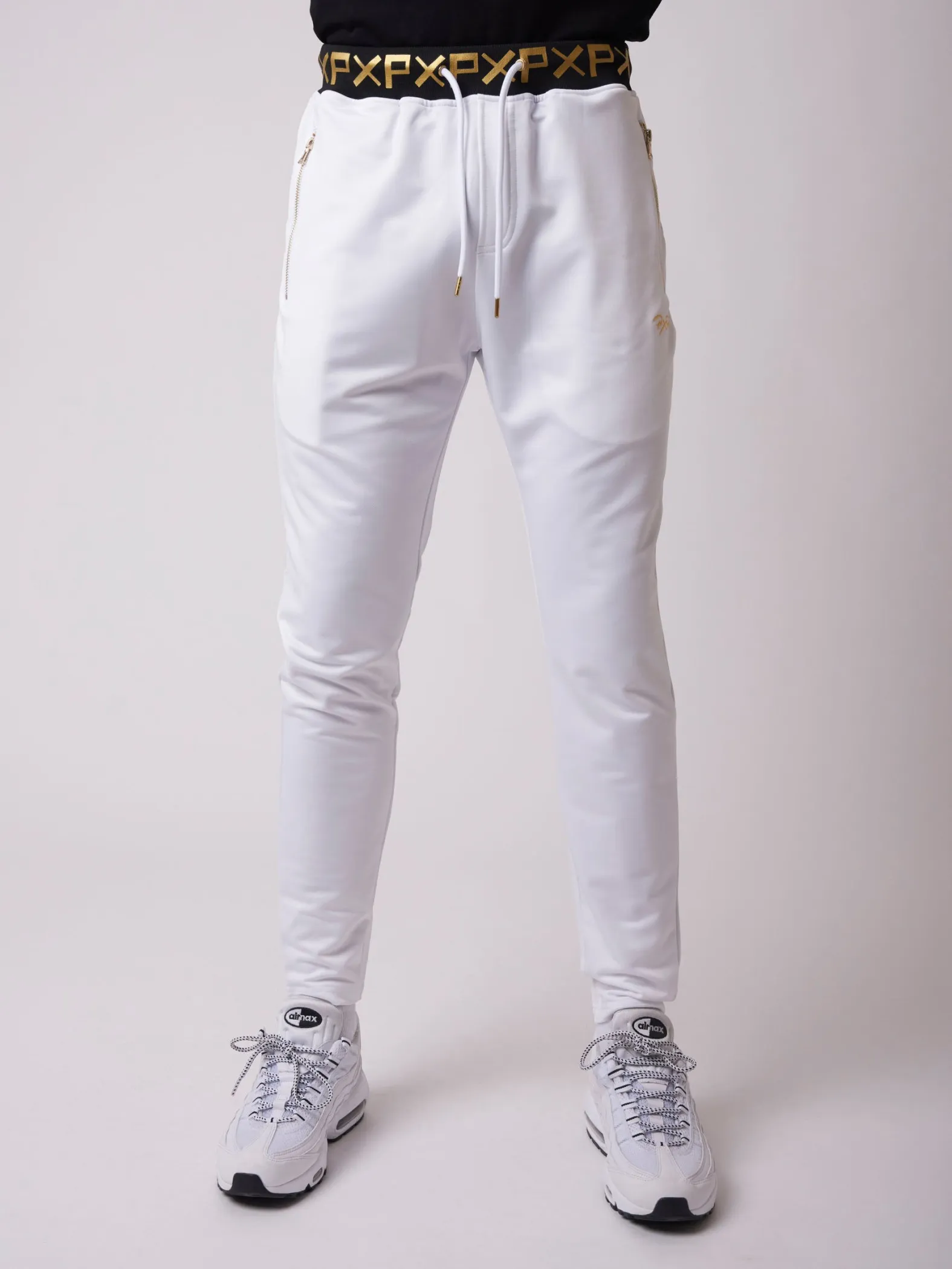 Pantalón de chándal con estampado dorado