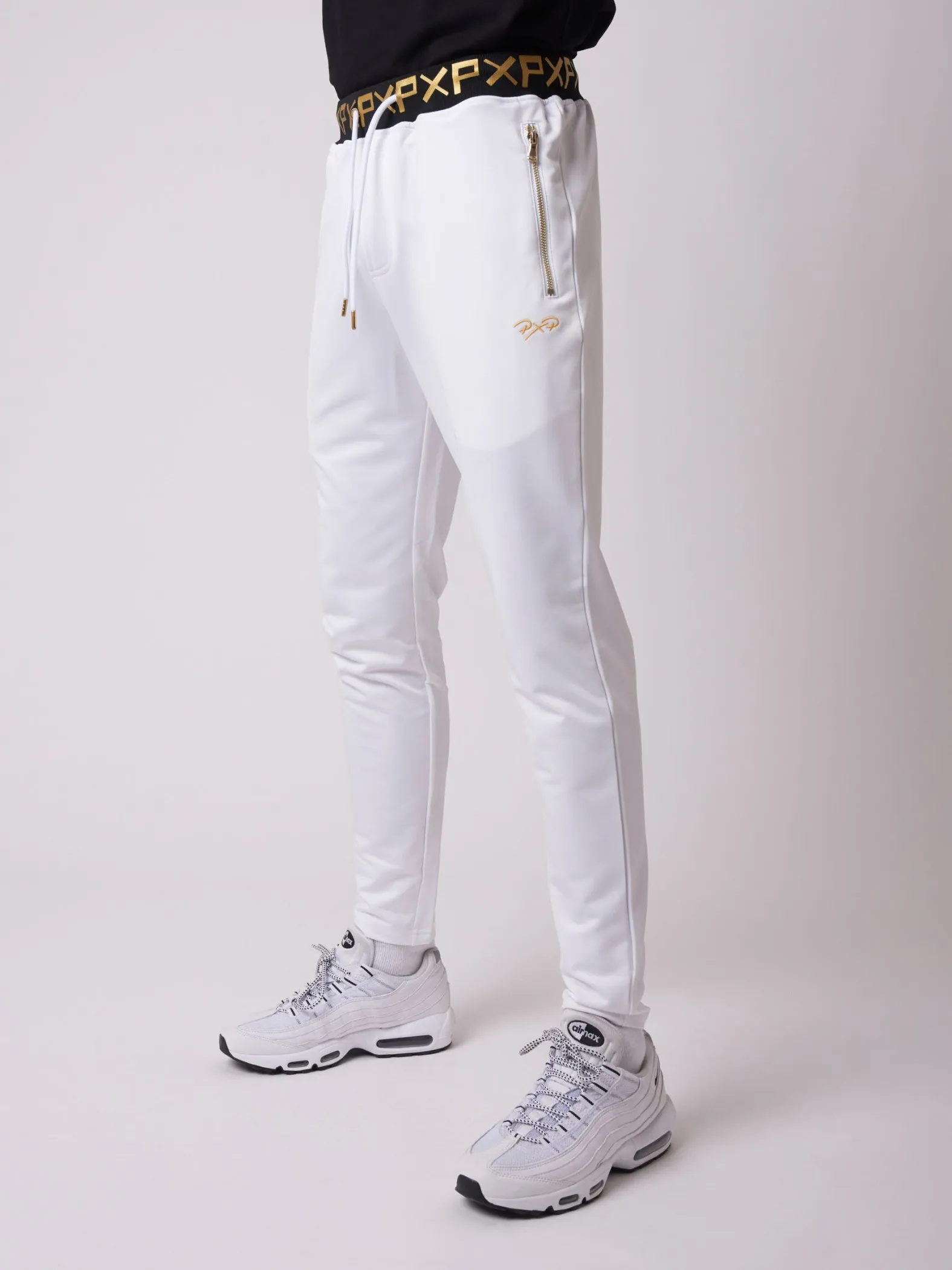 Pantalón de chándal con estampado dorado