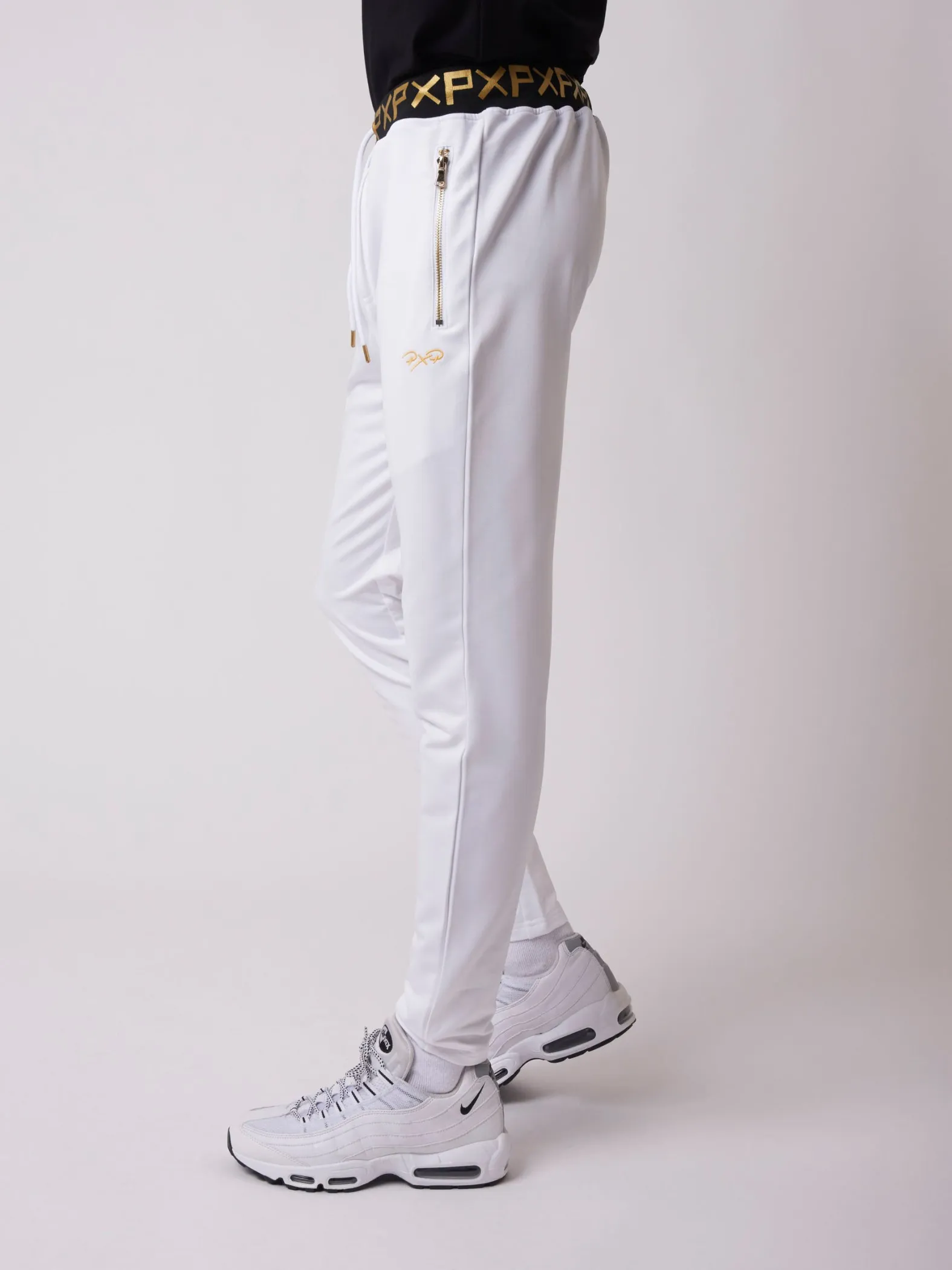 Pantalón de chándal con estampado dorado