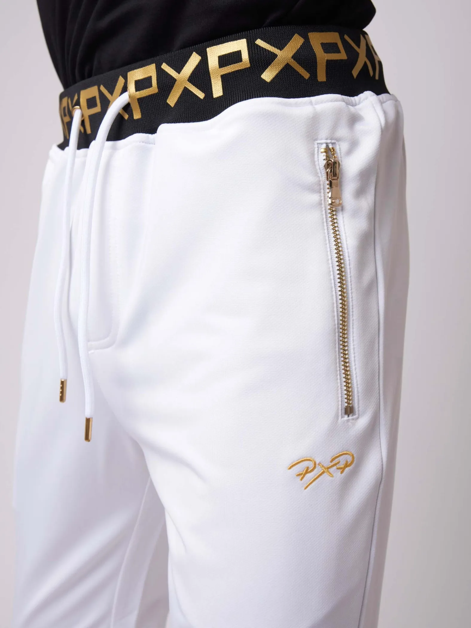 Pantalón de chándal con estampado dorado