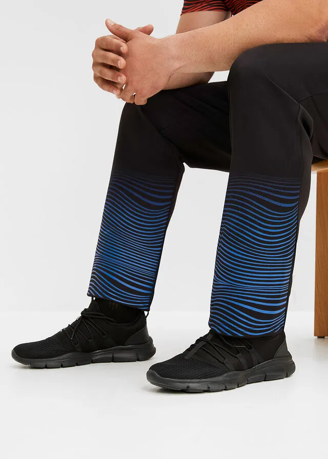 PANTALóN DEPORTIVO NEGROAZUR CON ESTAMPADO GRáFICO