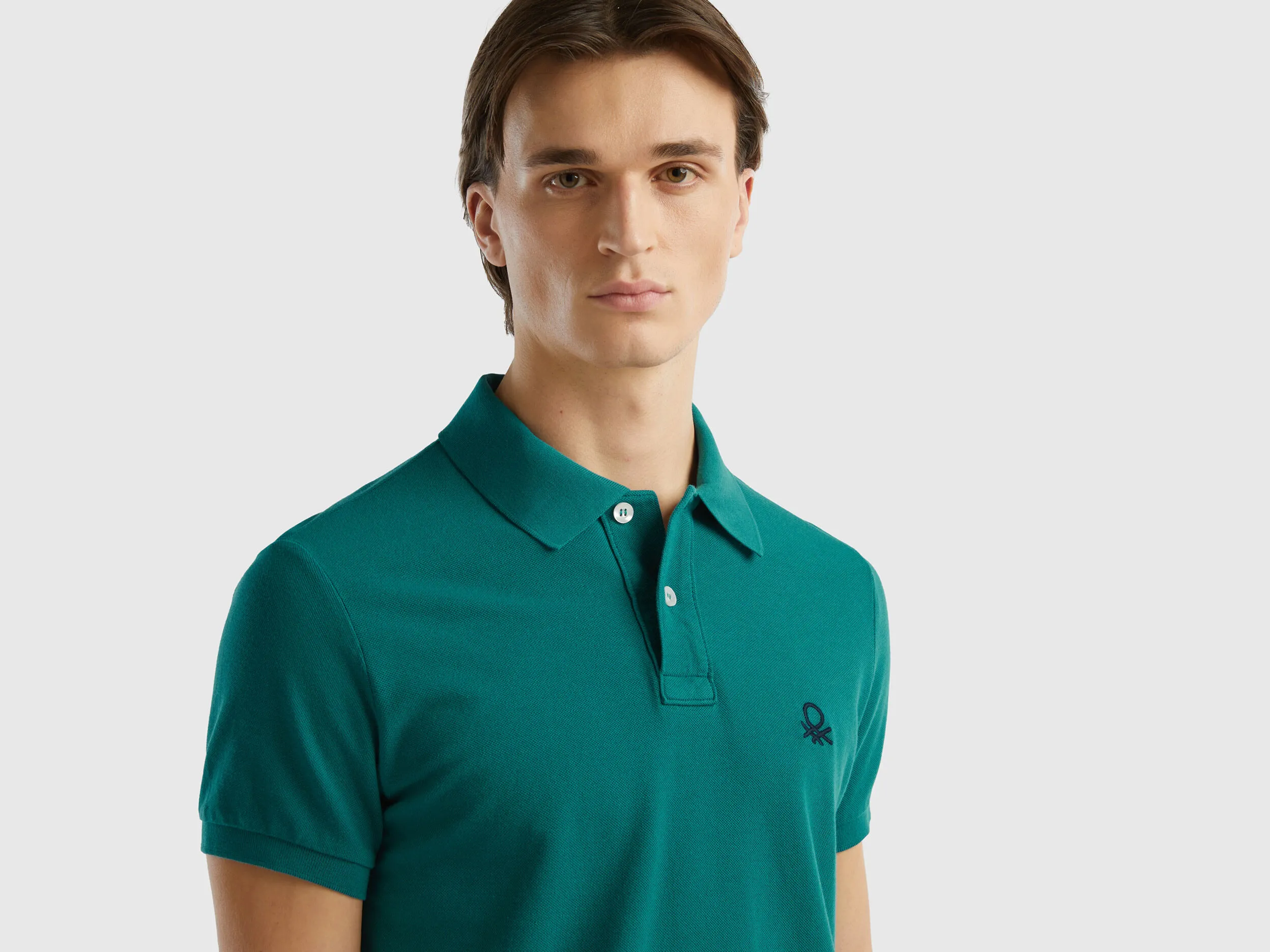 Polo verde petróleo slim fit