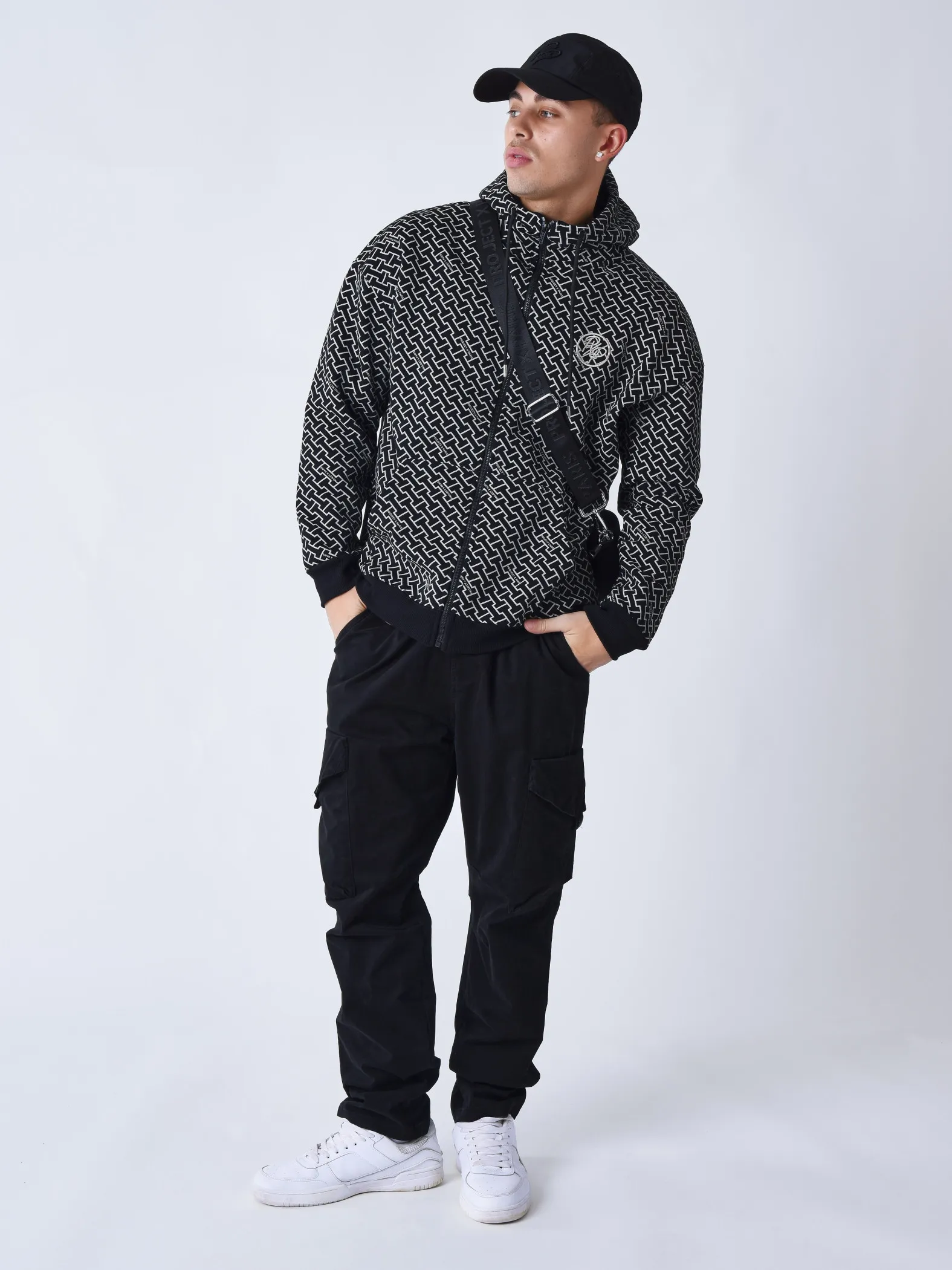 Sudadera con cremallera y monograma estampado