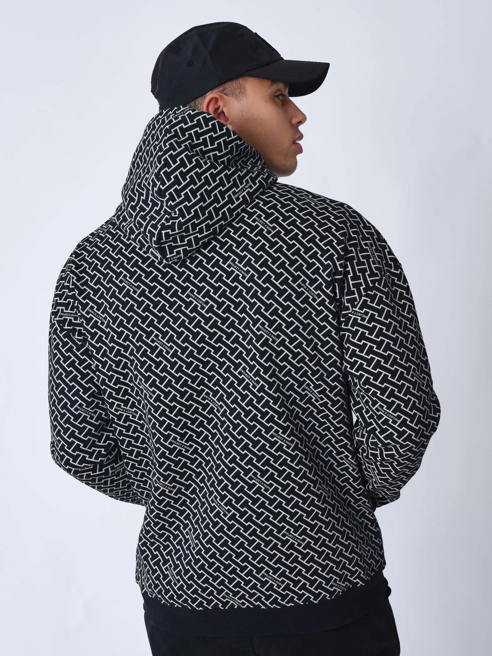 Sudadera con cremallera y monograma estampado