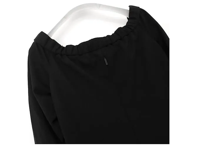 Tibi vestido de crepé negro con hombros descubiertos 