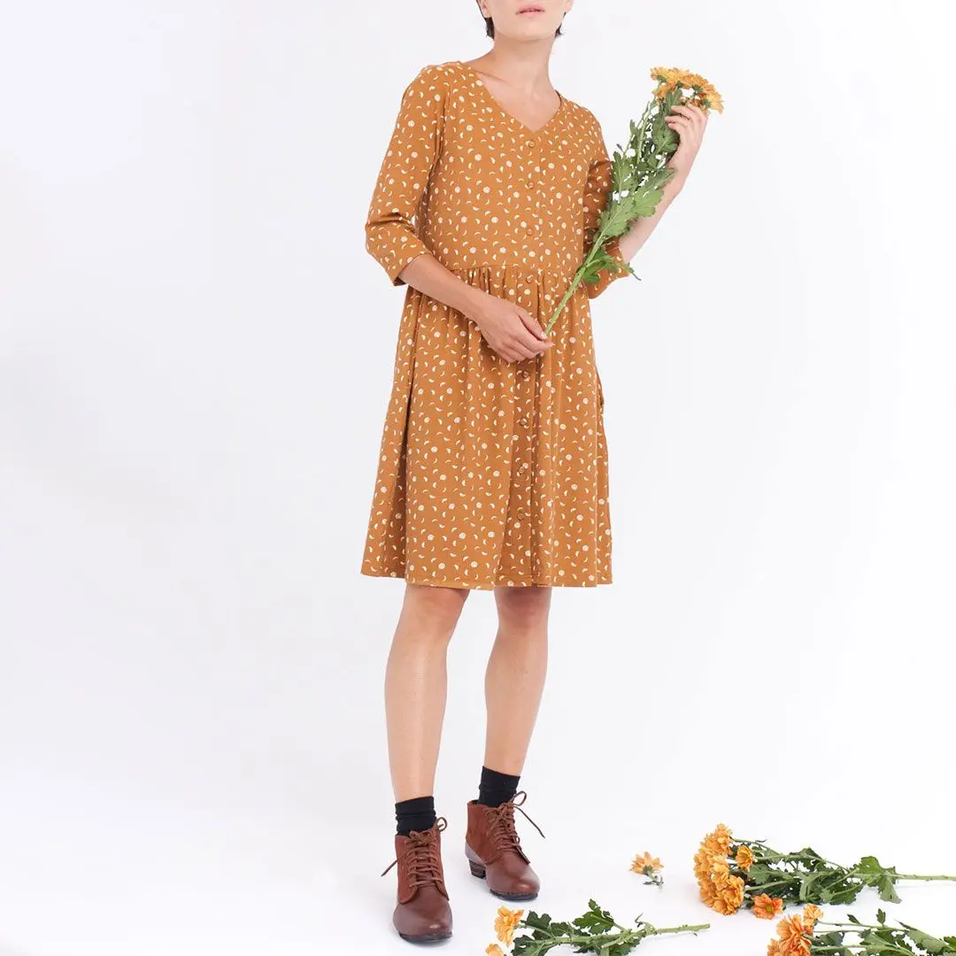 Vestido oversize con bolsillos color mostaza